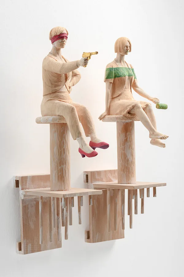 Zwei Sitzende mit Pistole — Holz, gefasst mit Blattgold